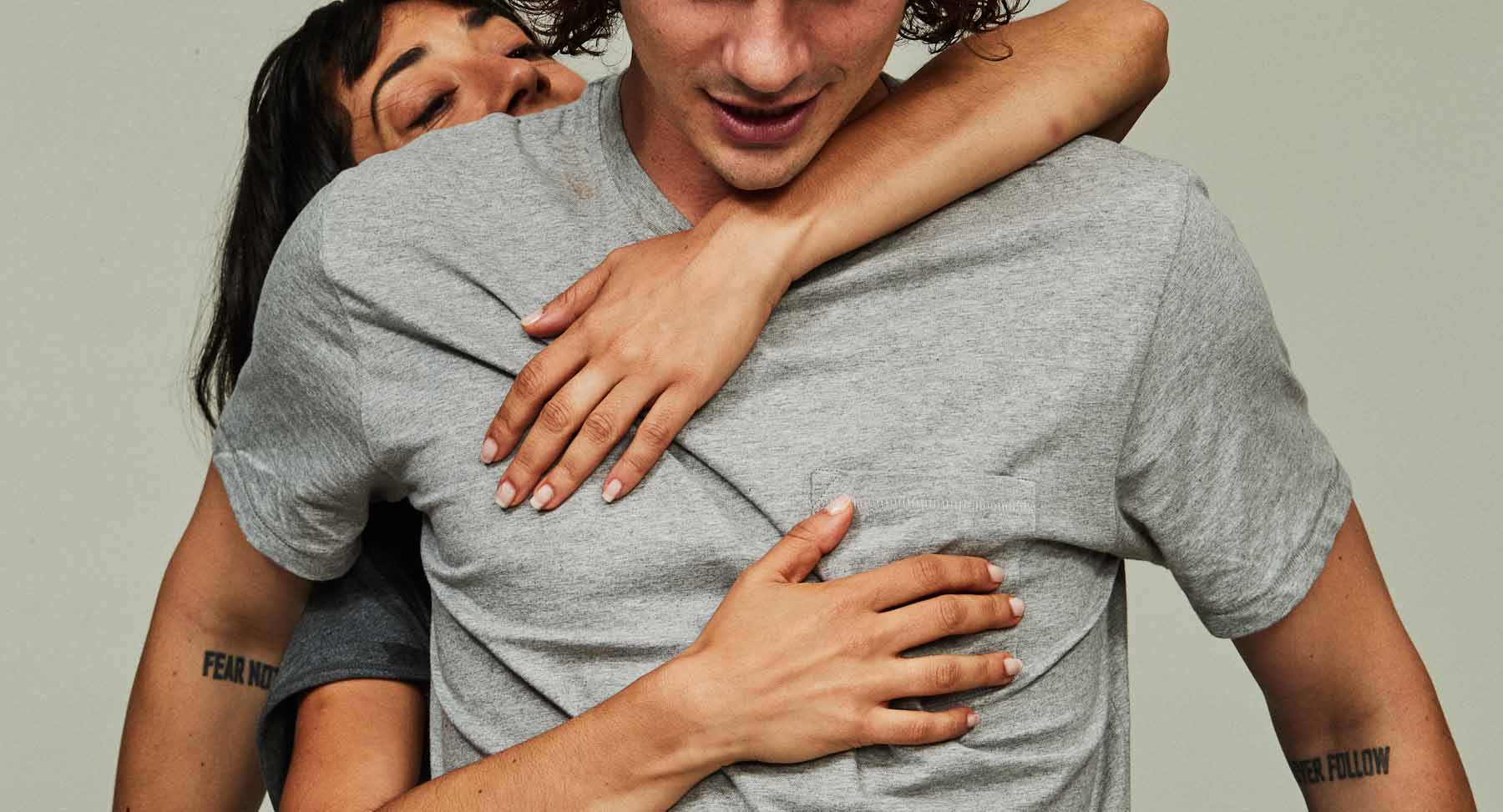 woman hugging the man from behind